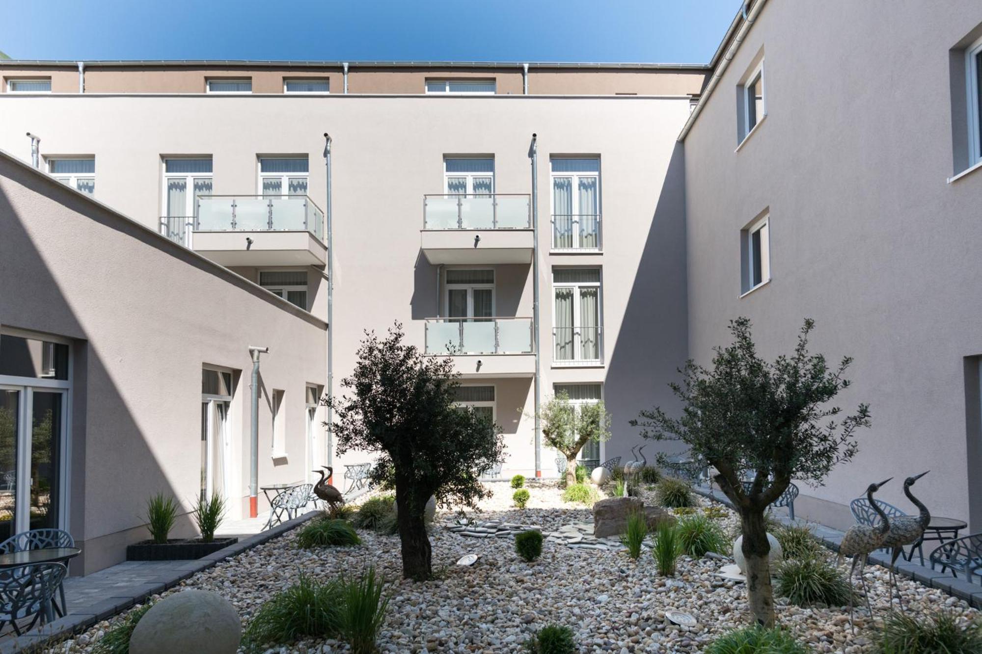 Atrium Apart Hotel Bruehl Exterior foto