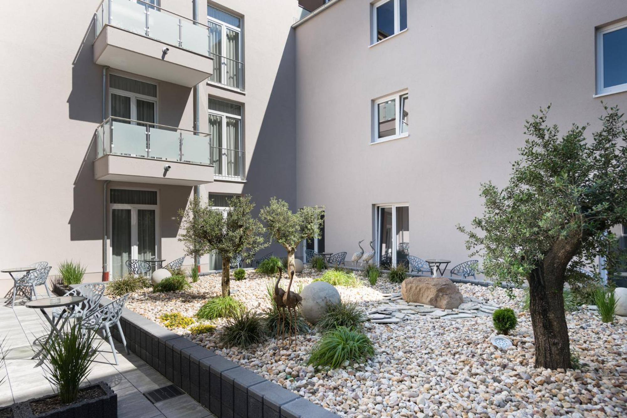 Atrium Apart Hotel Bruehl Exterior foto